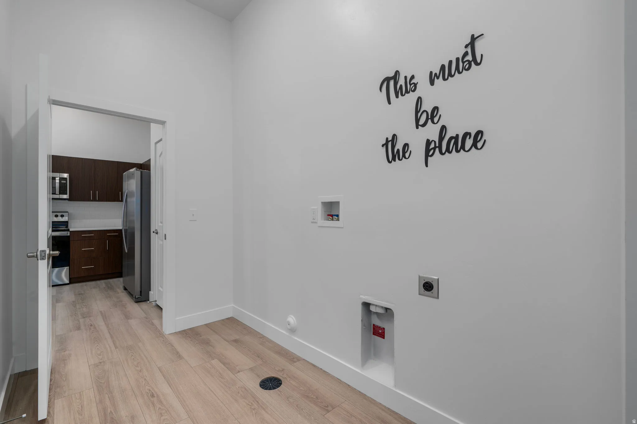 Laundry conveniently located off the kitchen with access to the garage and community breezeway.