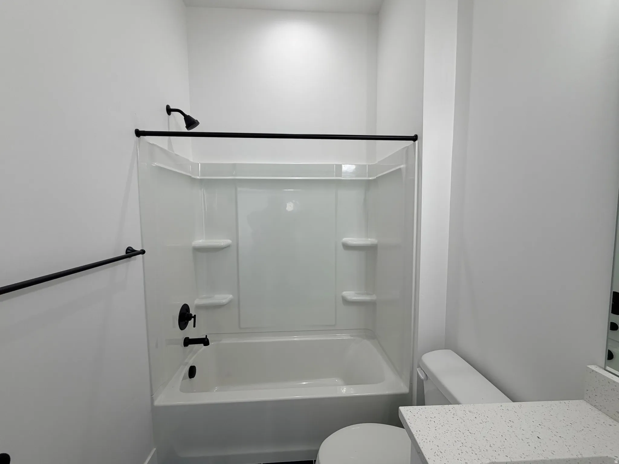 Full bath featuring vanity and shower / washtub combination