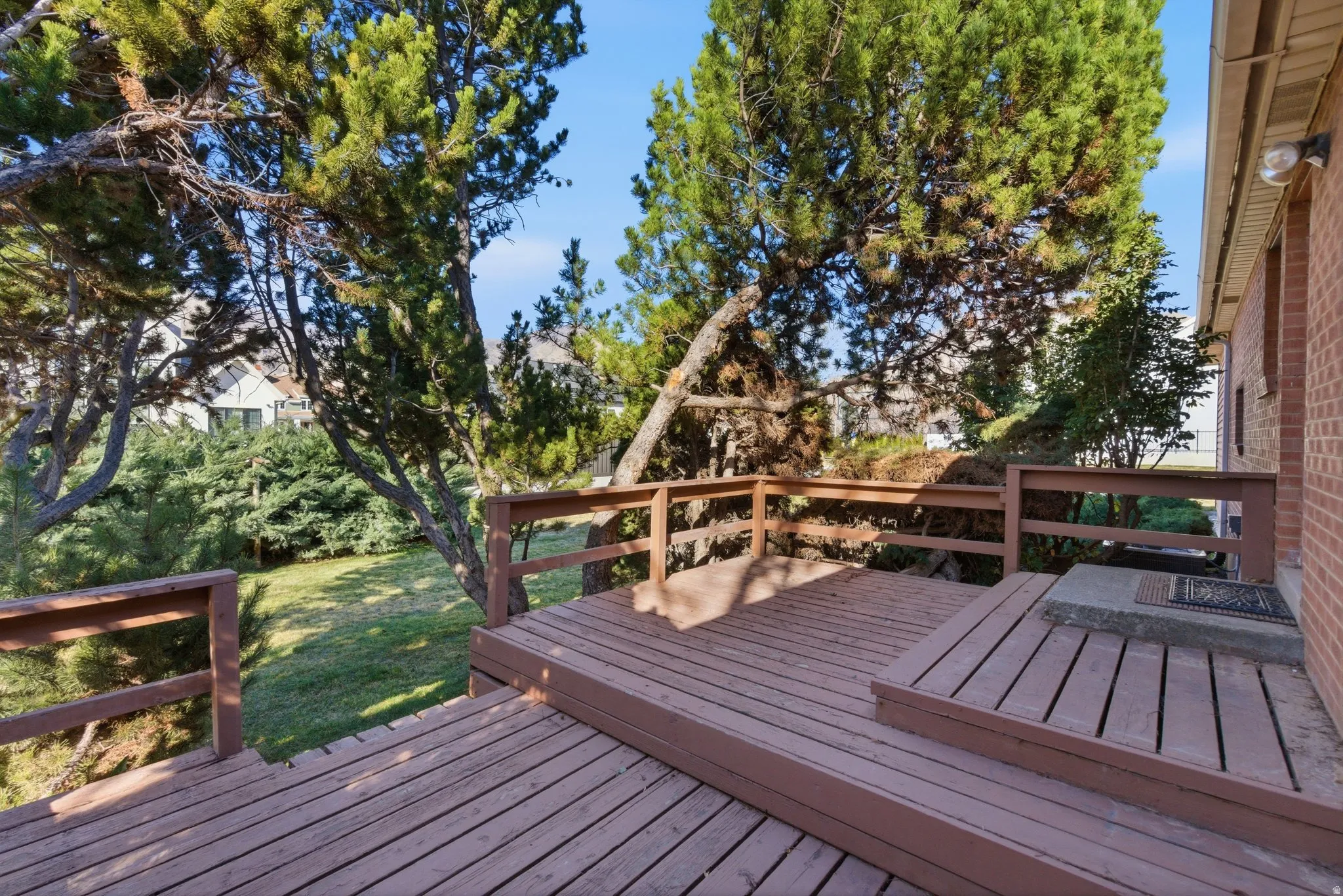 Deck featuring a lawn