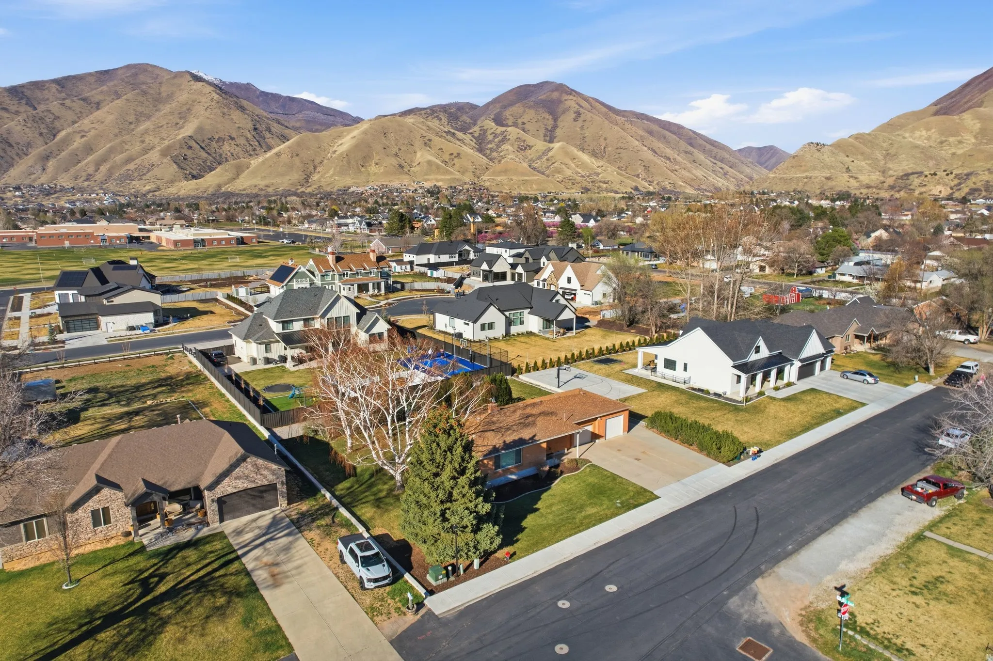 Aerial perspective of suburban area featuring mountains