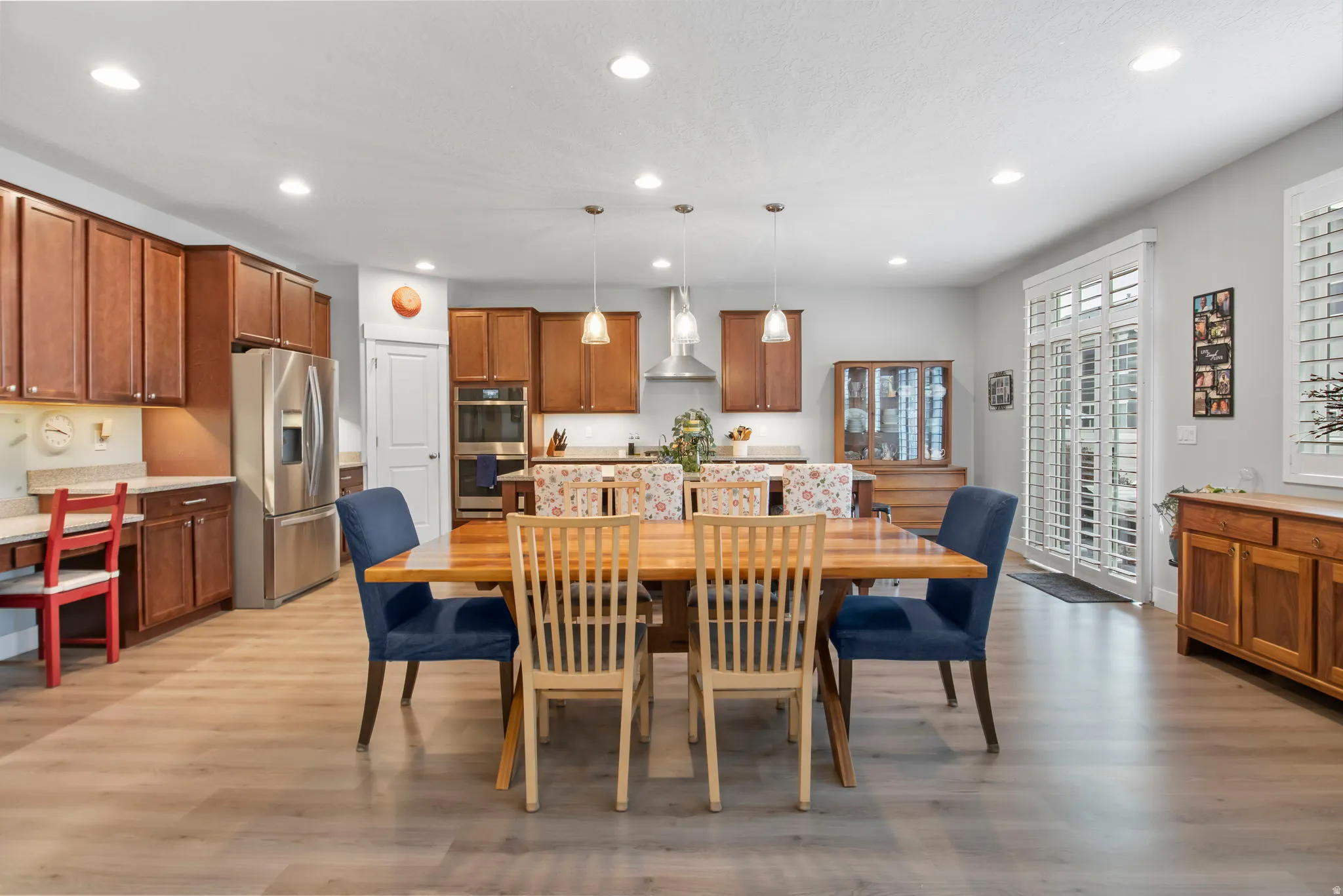 Dining area featuring recessed lighting and light wood finished floors