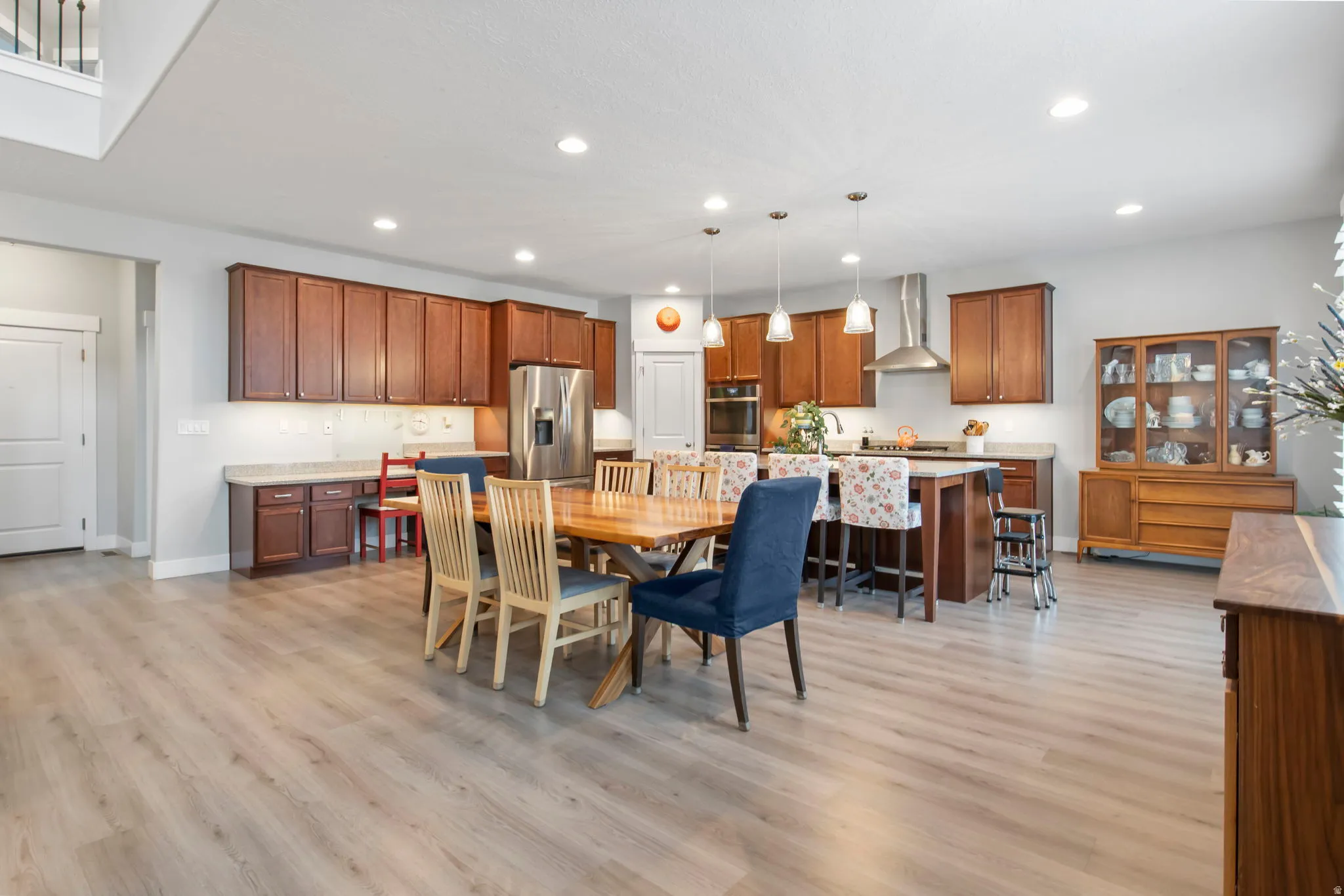 Dining area featuring light wood-type flooring and recessed lighting