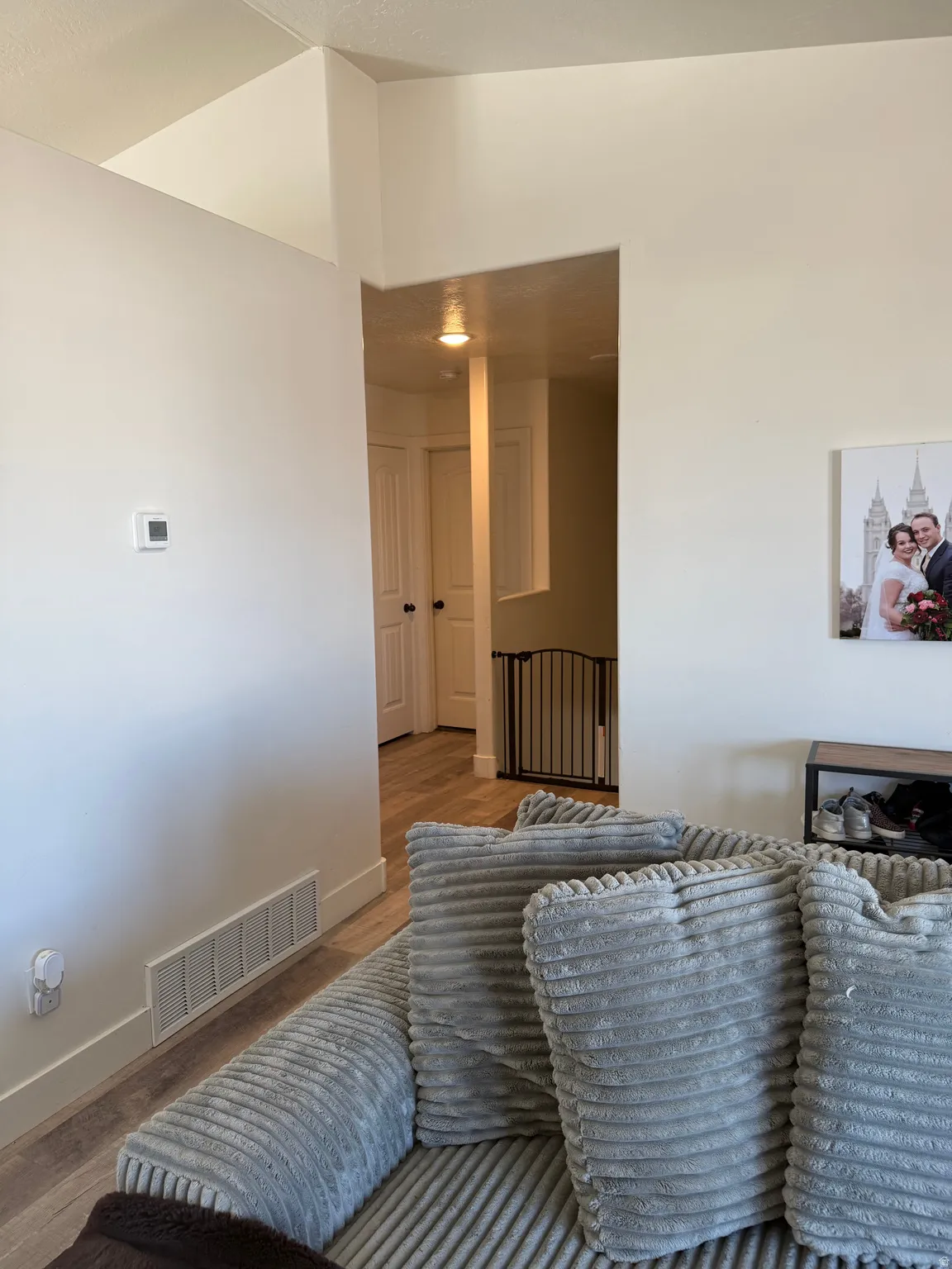 Living area featuring wood finished floors and baseboards