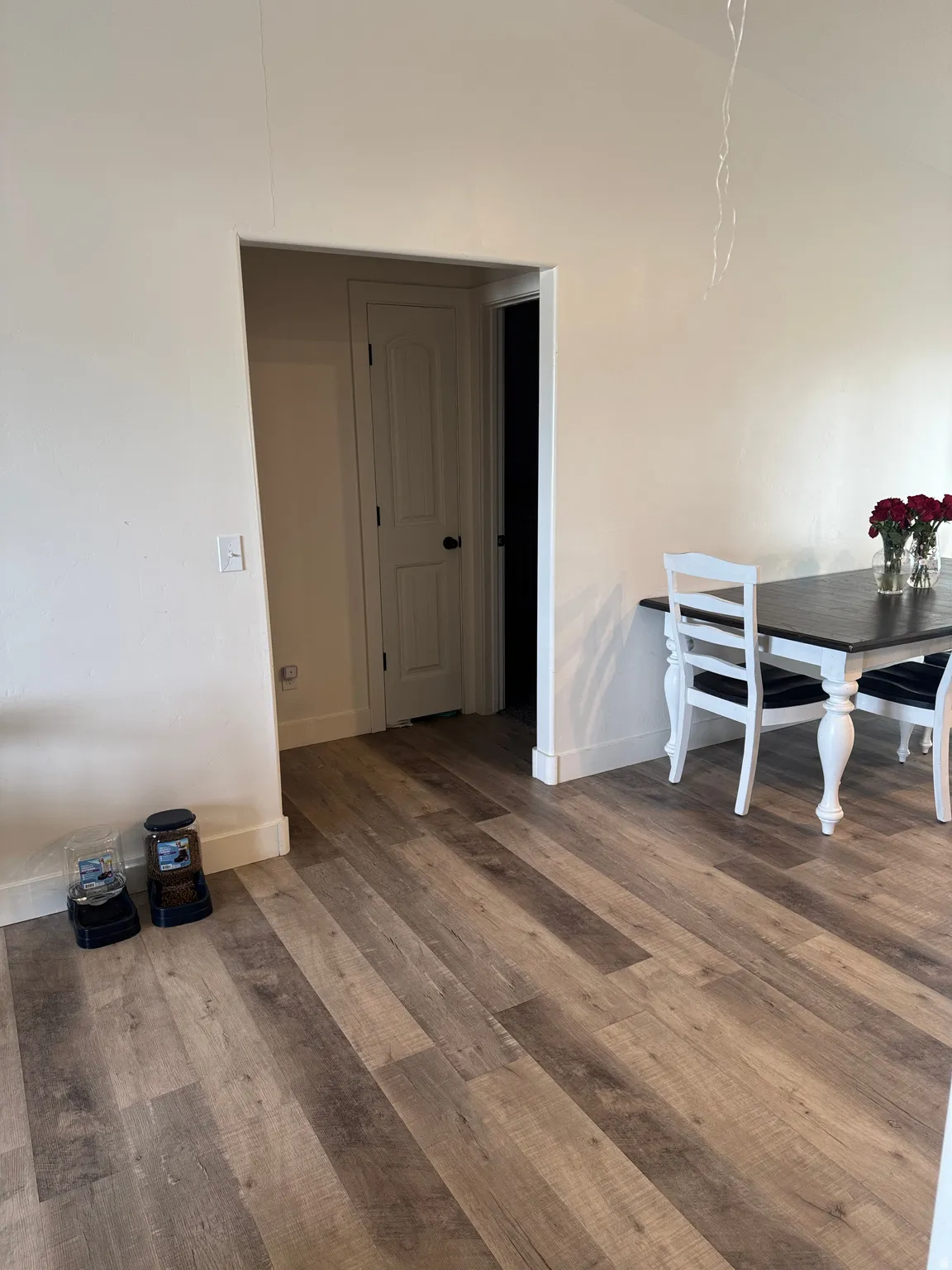Dining area with wood finished floors and baseboards
