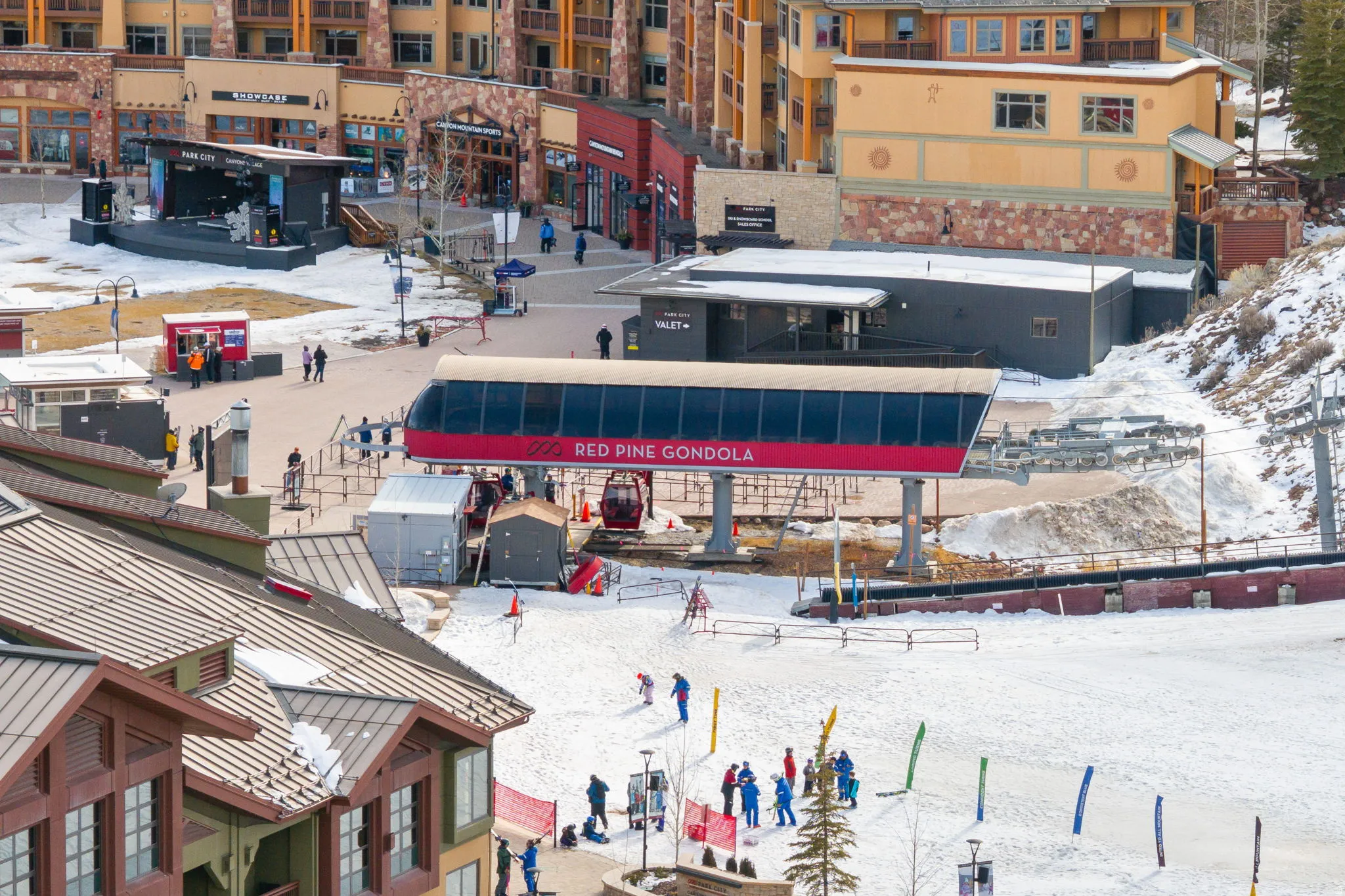 Snowy aerial view featuring view of commercial area