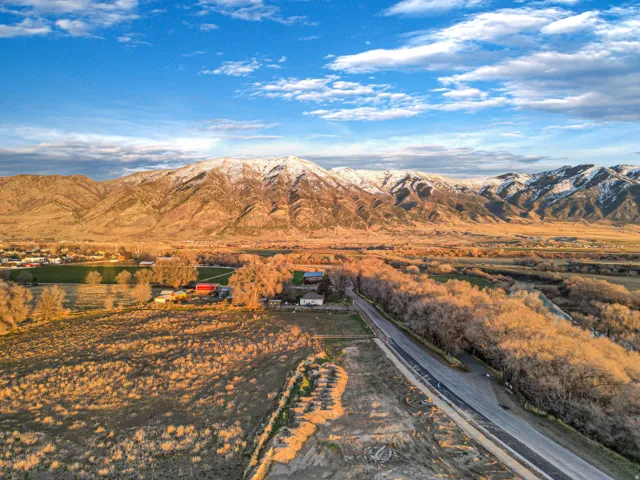 View of mountain background featuring rural landscape