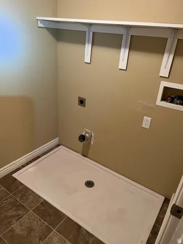Laundry room featuring washer hookup and hookup for an electric dryer