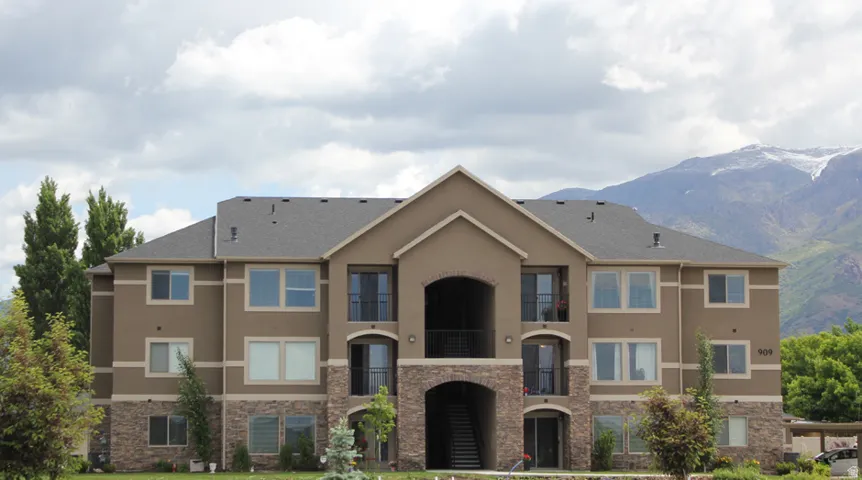View of building exterior featuring a mountain view