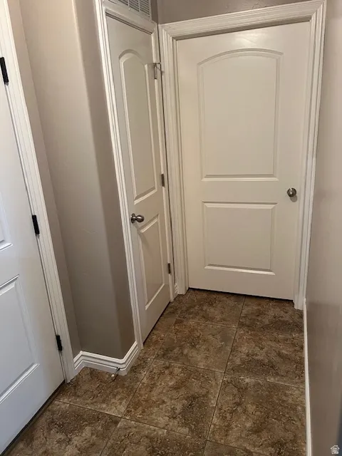 Hall featuring baseboards