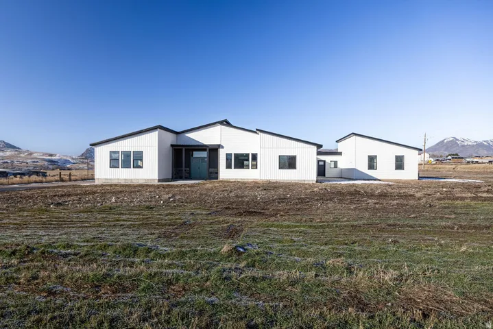 View of front of property featuring a mountain view