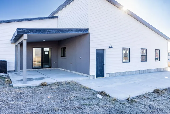 Rear view of house with a patio