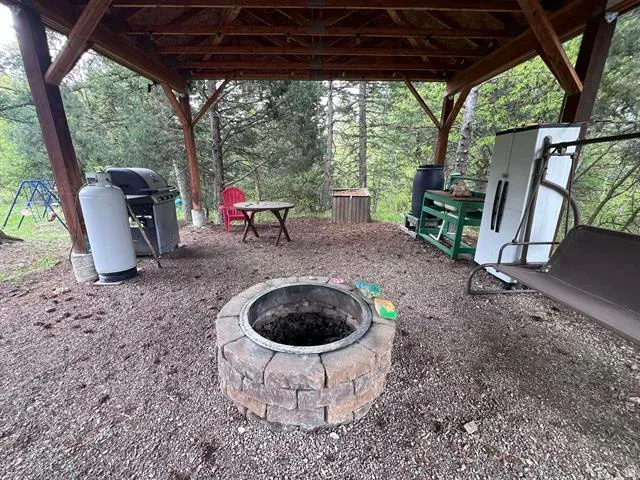 View of patio featuring area for grilling