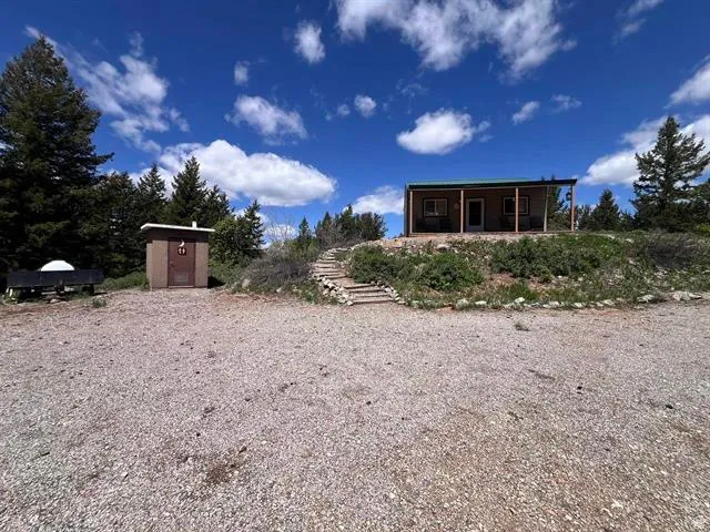 View of yard with a storage shed