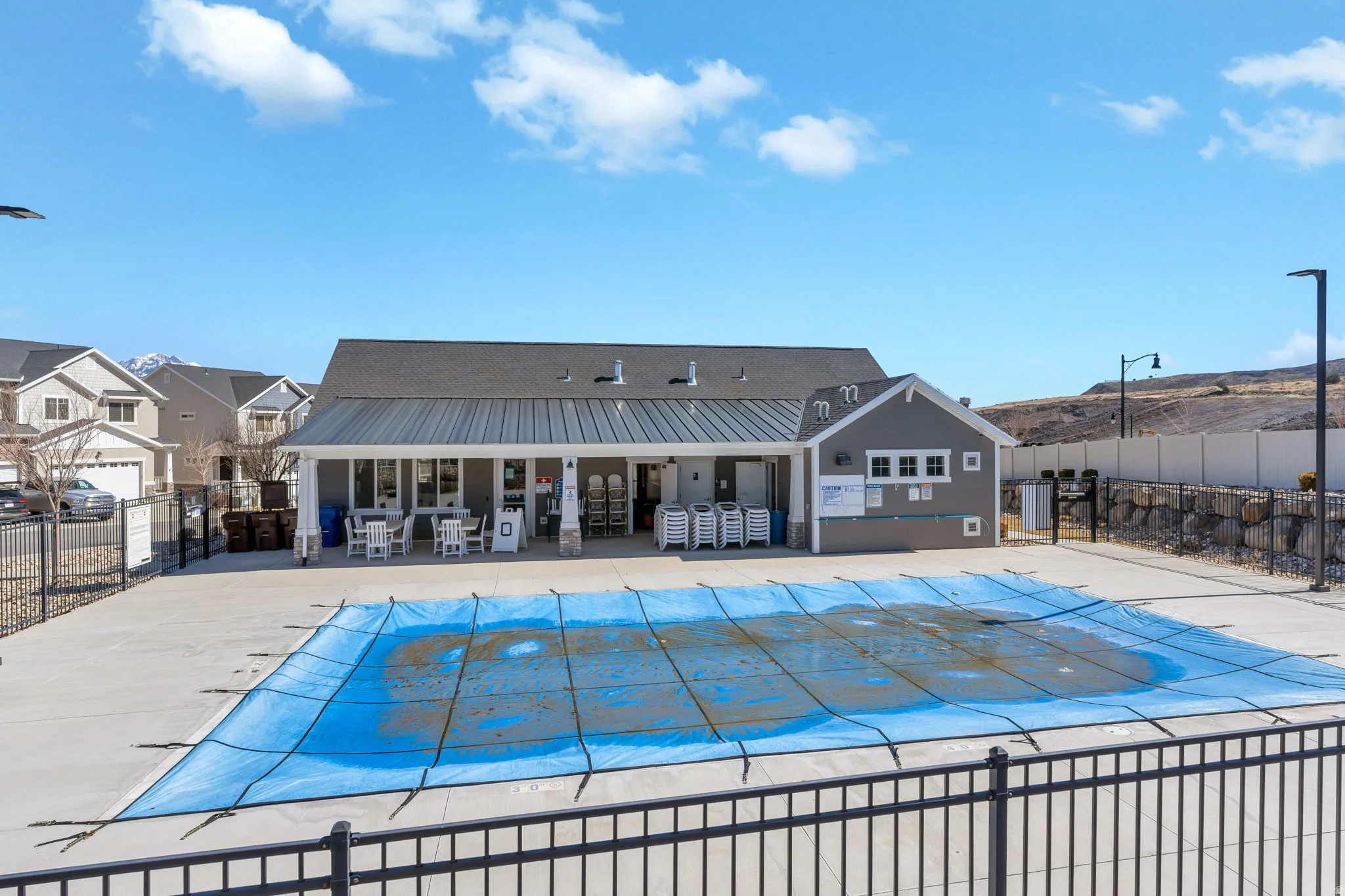 Community pool featuring a patio area
