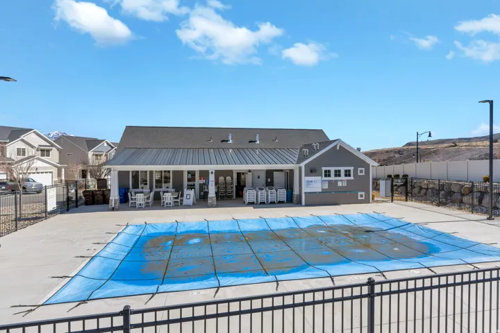 Community pool featuring a patio area