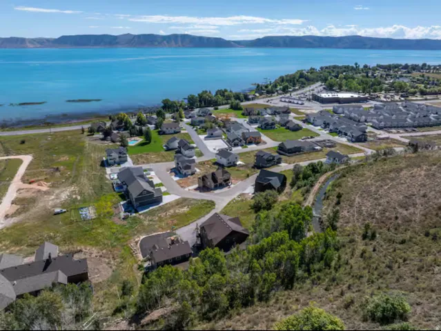 Aerial view of residential area with a water and mountain view