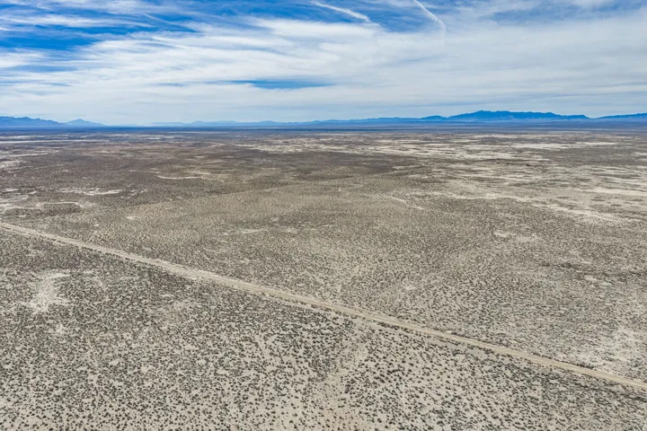View of rural area with mountains and a desert landscape