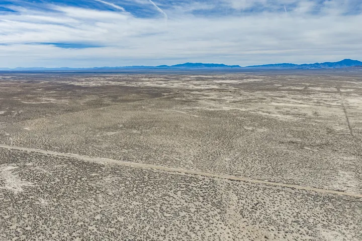 View of mountain background featuring a desert landscape and rural landscape