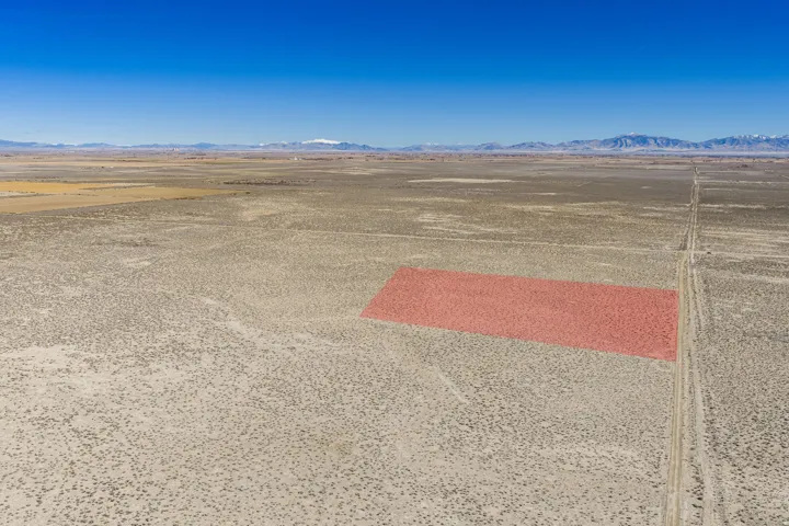 View of rural area with mountains and a desert landscape