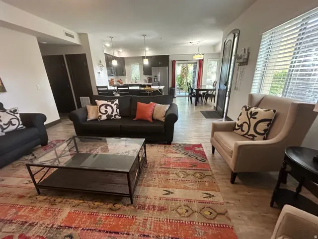 Living area with light wood finished floors