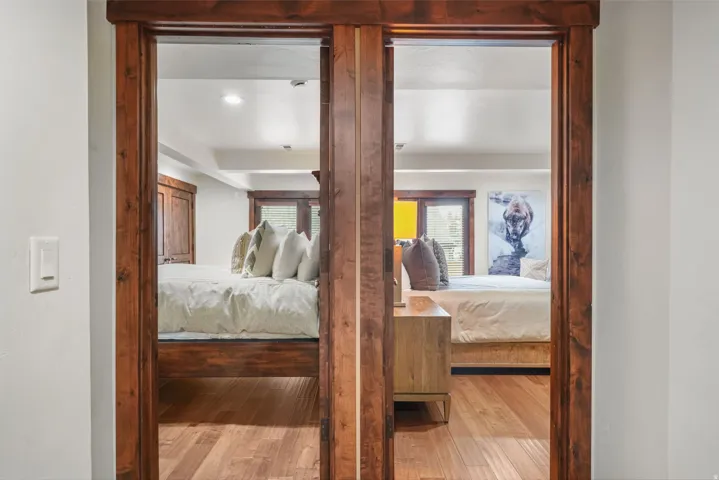 Bedroom with light wood-type flooring and recessed lighting
