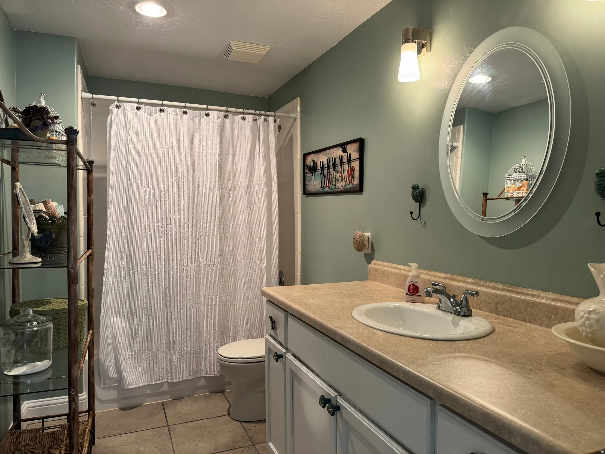 Full bathroom featuring vanity, light tile patterned flooring, and recessed lighting