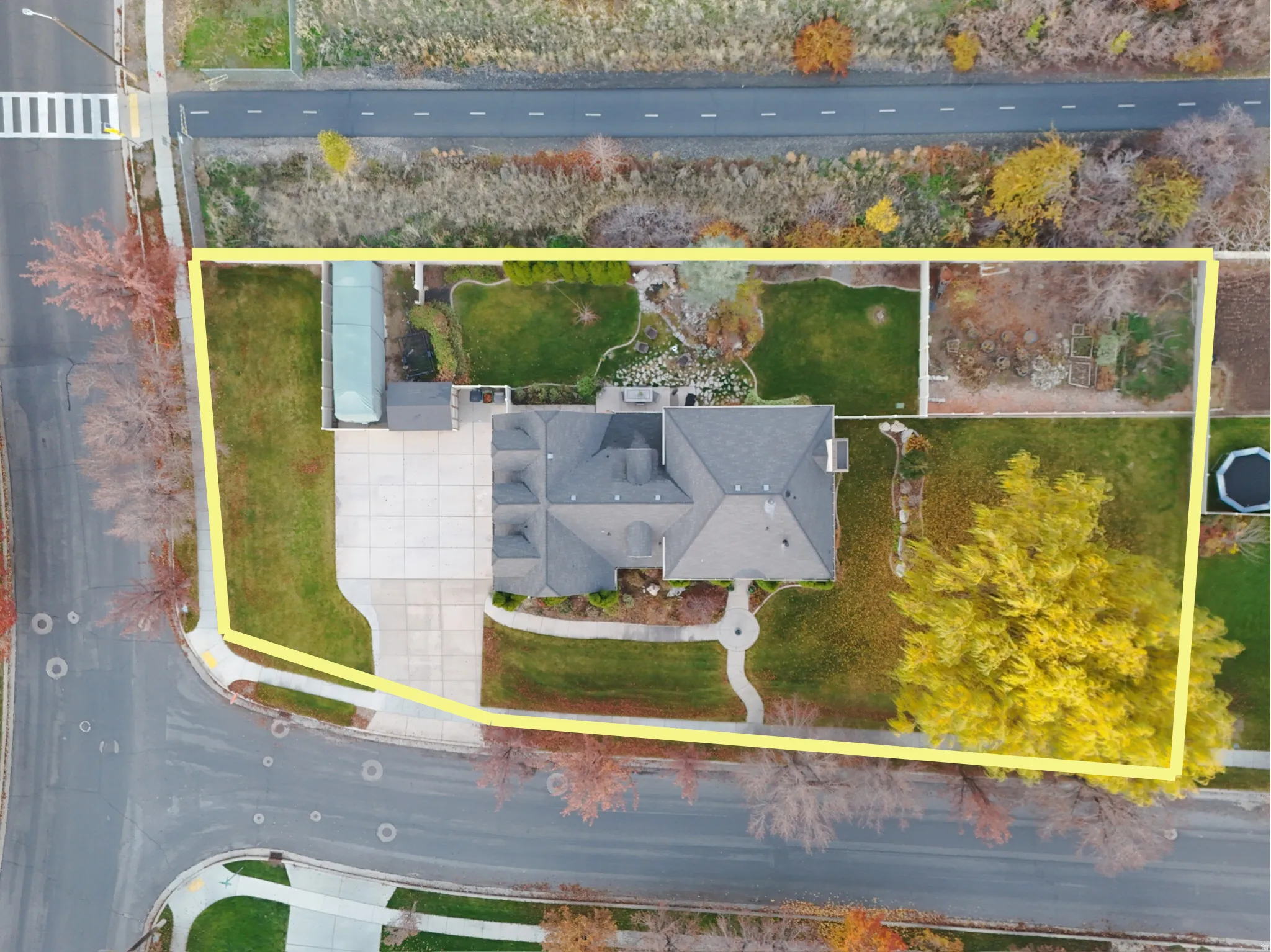 Aerial view of property's location featuring property parcel outlined