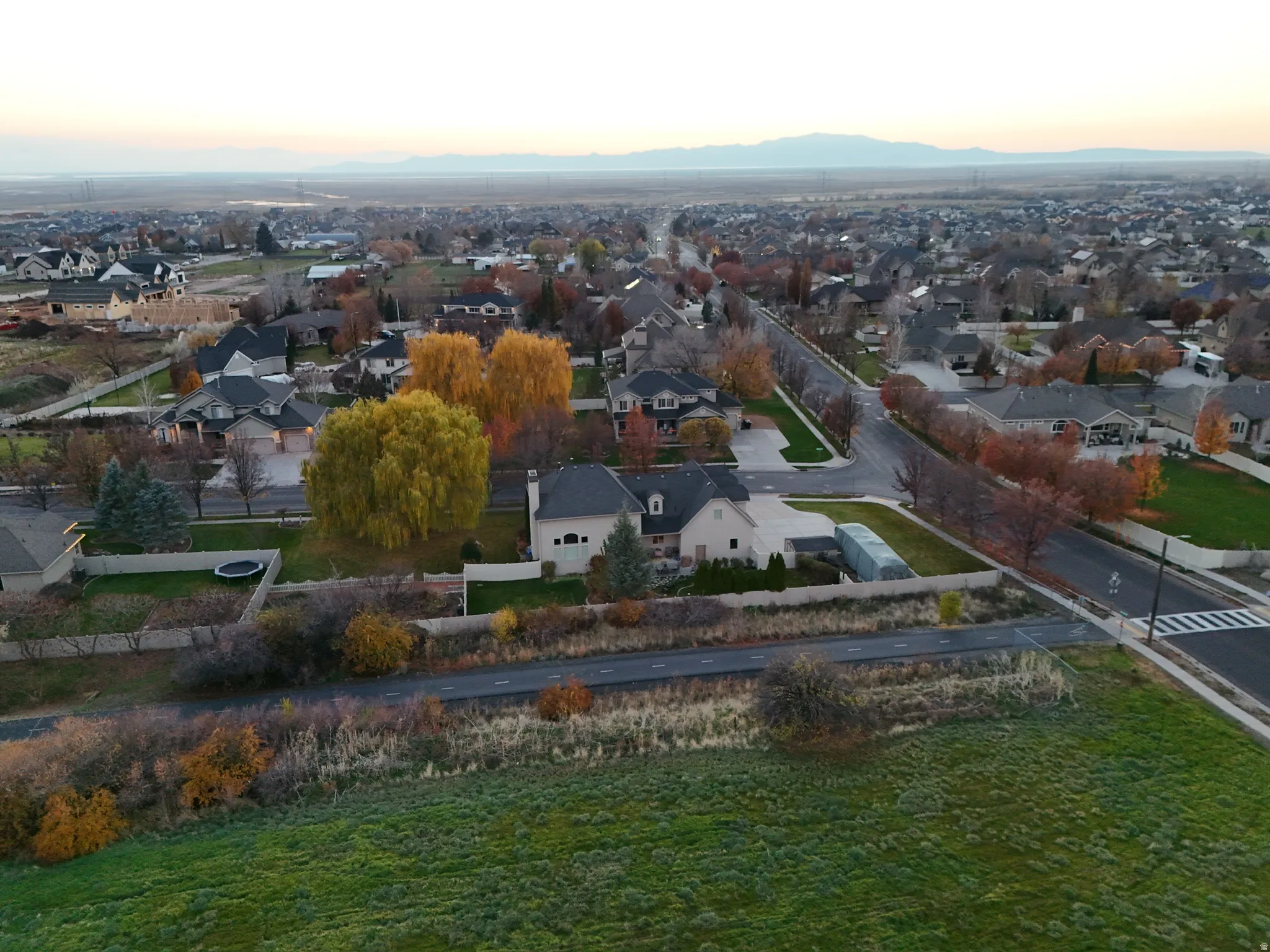 Aerial view of residential area featuring mountains