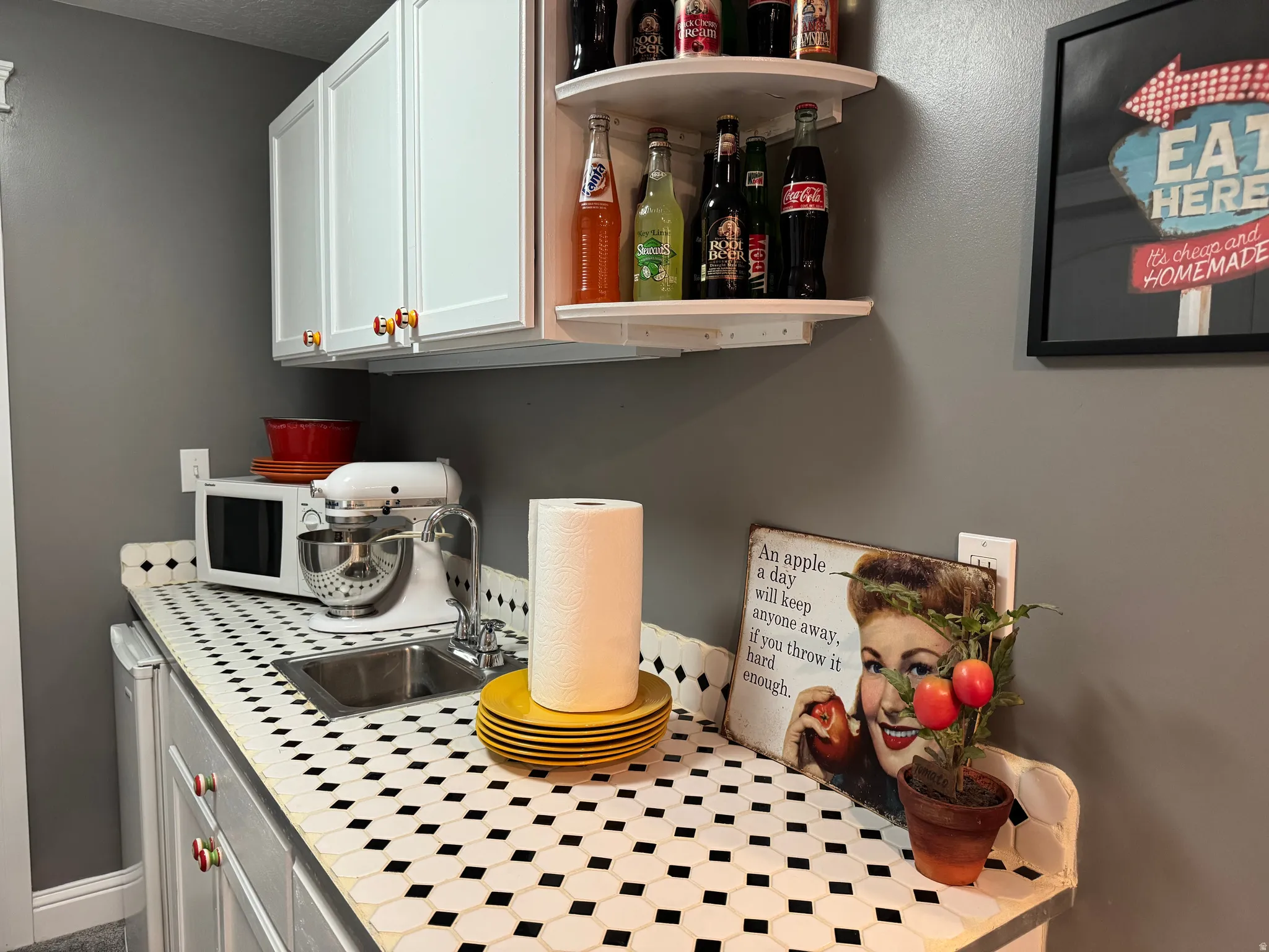 Detailed view of a sink and white microwave