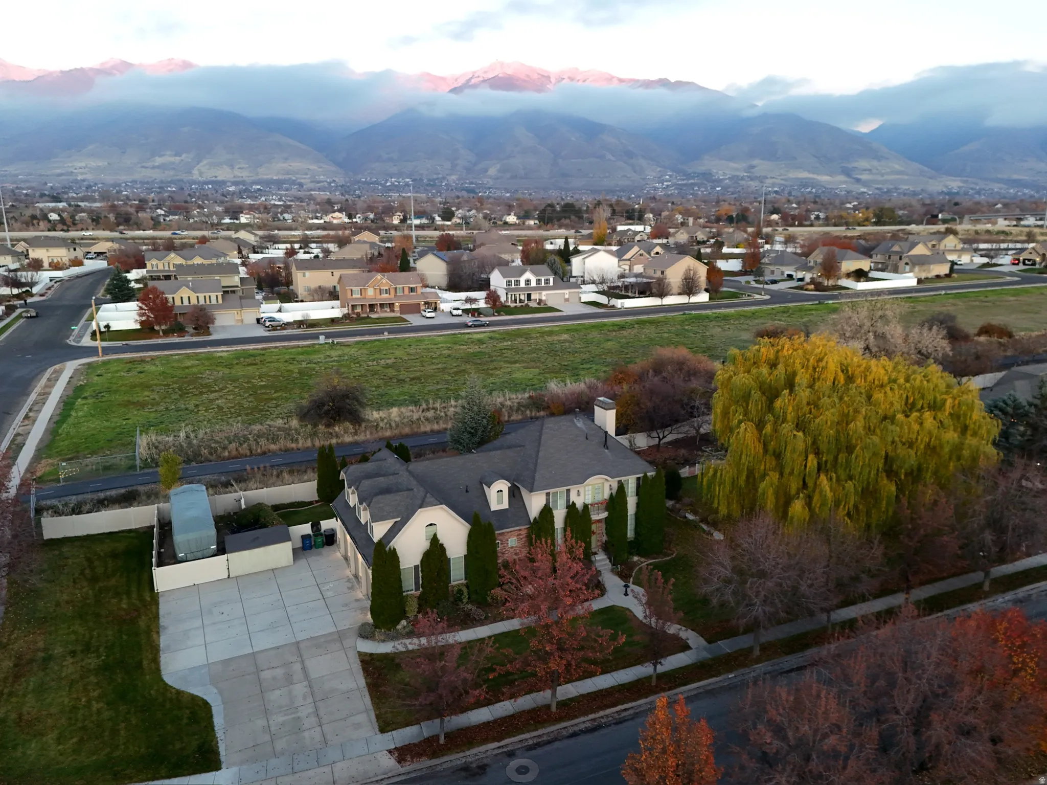 Aerial view of residential area with a mountainous background