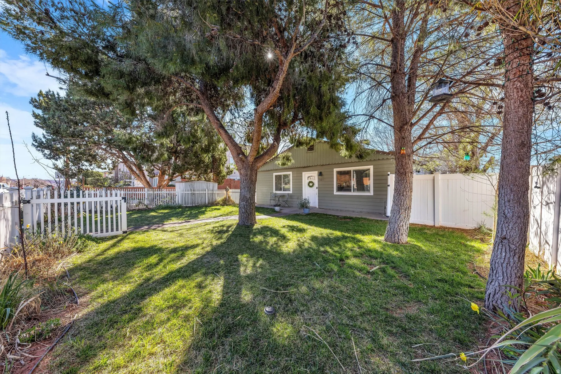 View of front of house featuring a fenced backyard