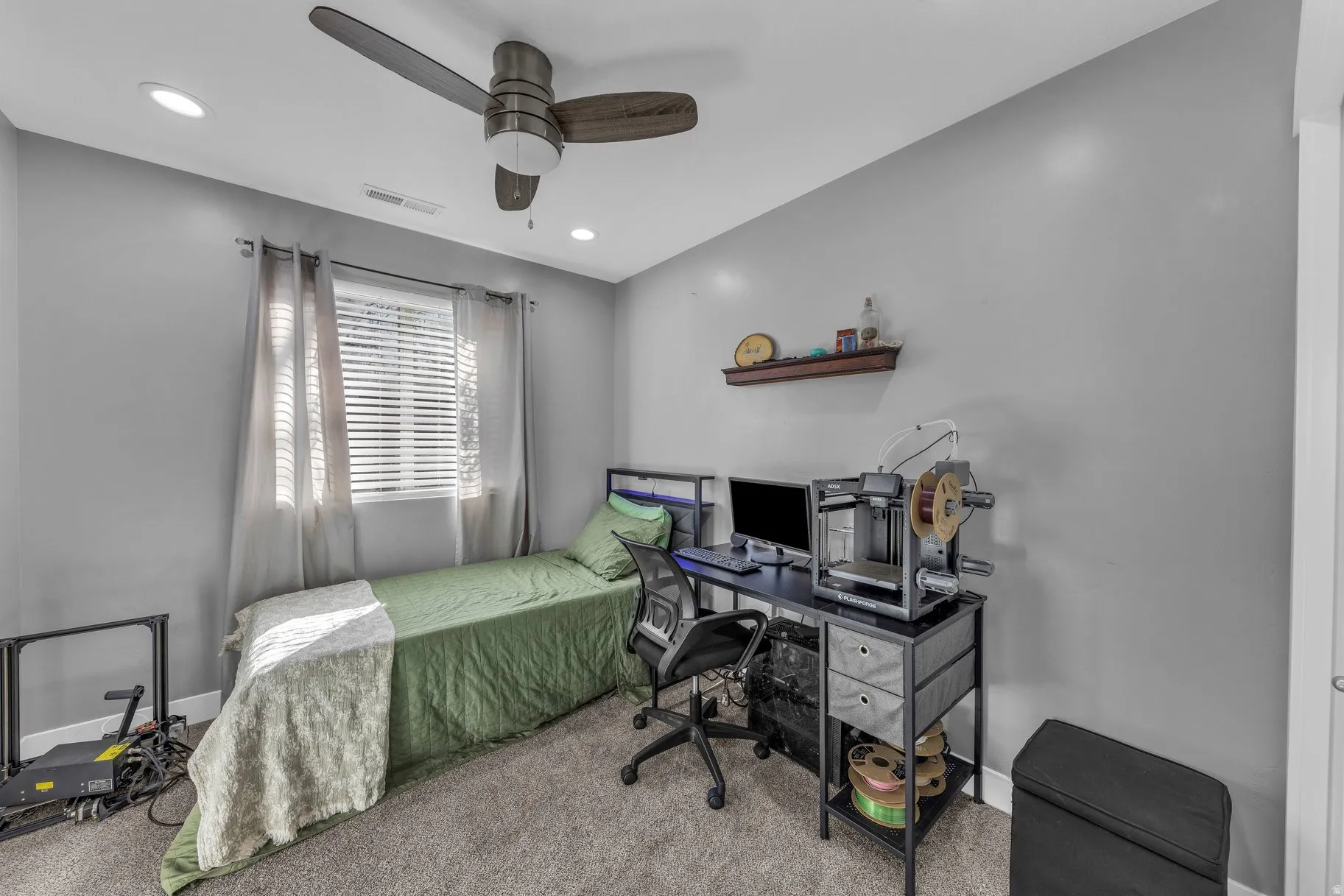 Bedroom with a desk, ceiling fan, carpet floors, and recessed lighting
