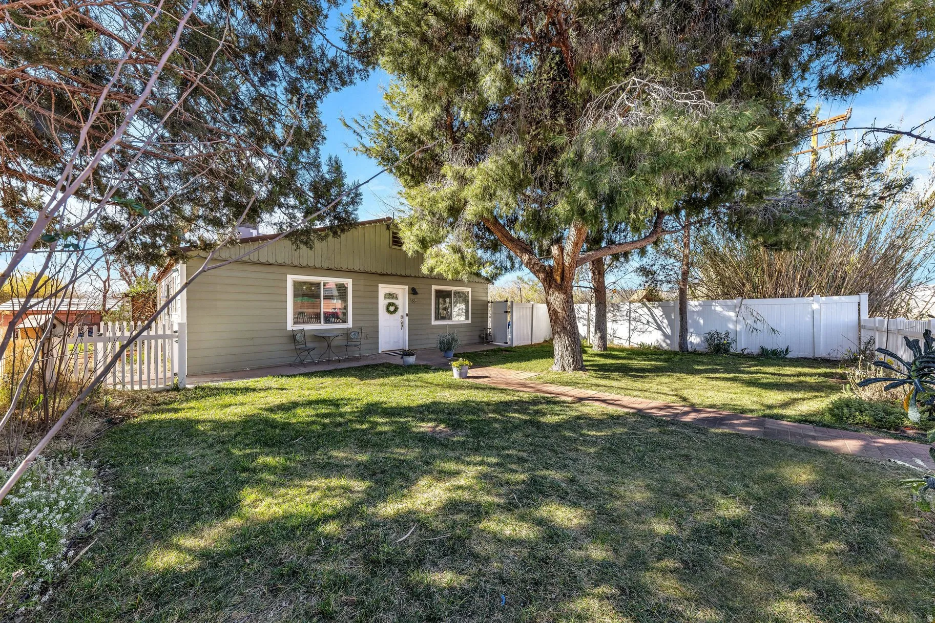 View of front of property featuring a fenced backyard