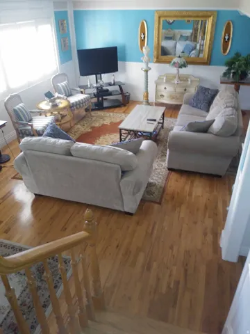 Living room featuring light wood finished floors
