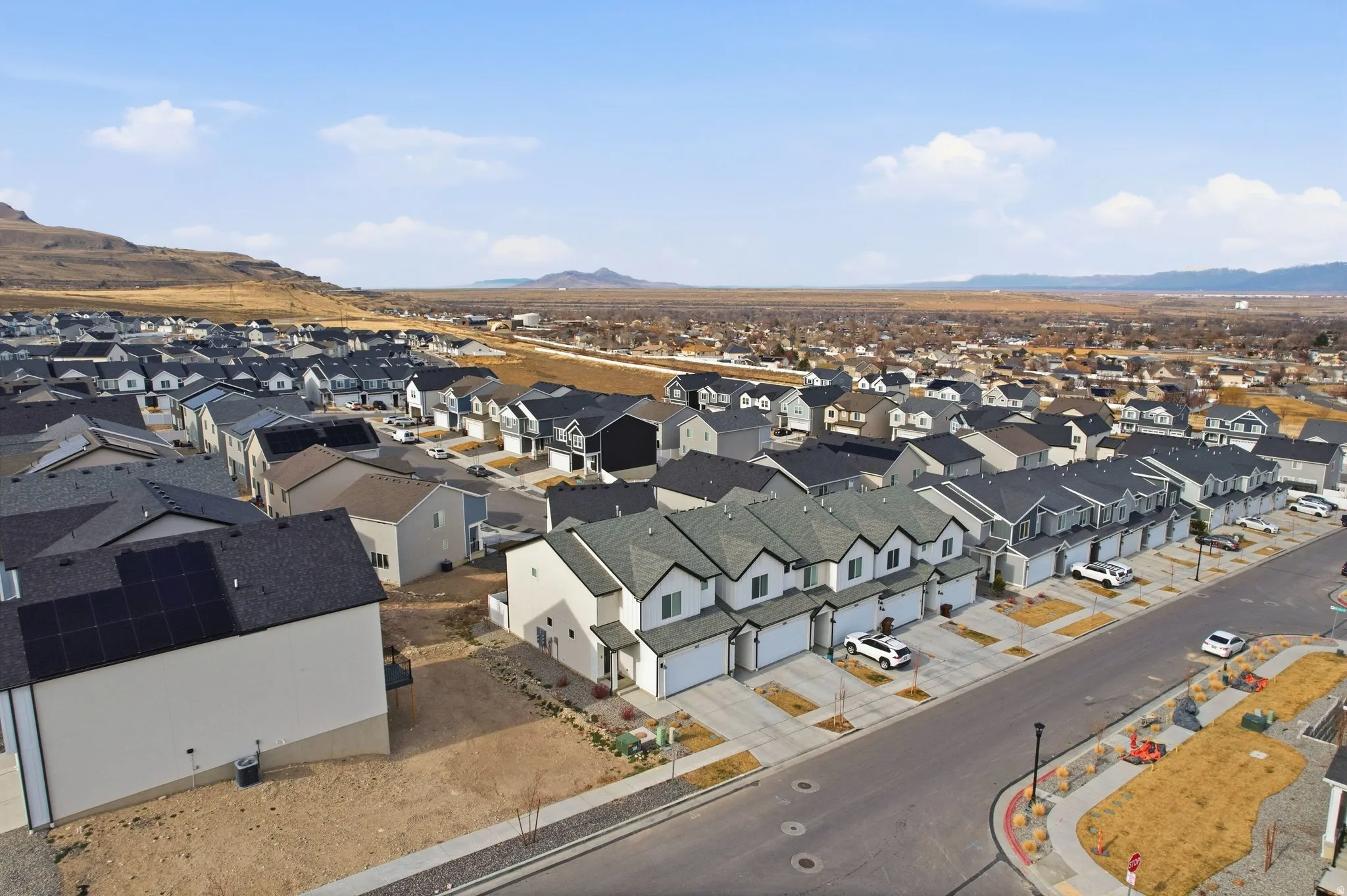 Aerial perspective of suburban area featuring mountains