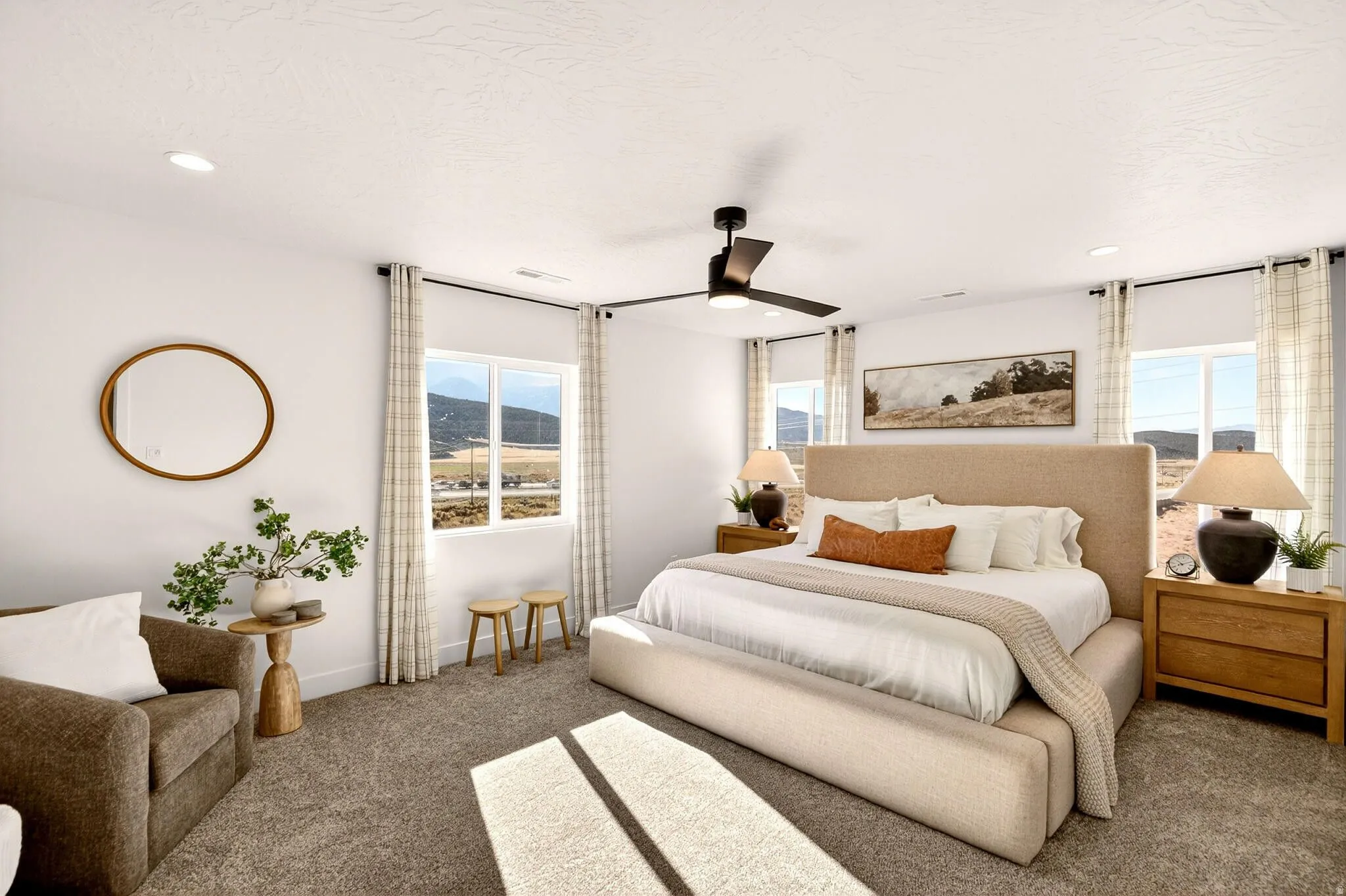 Primary bedroom with on suite bathroom featuring a double vanity, walk-in shower, & walk-in closet.