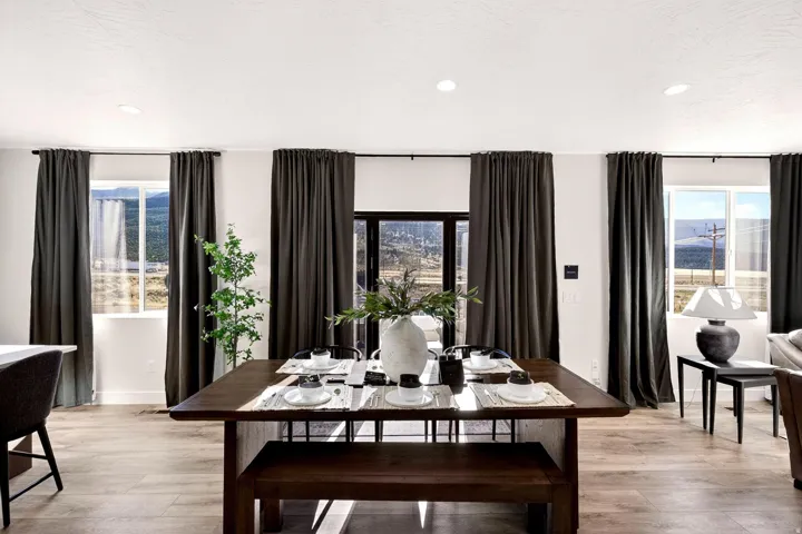 Dining area featuring light wood-type flooring and recessed lighting