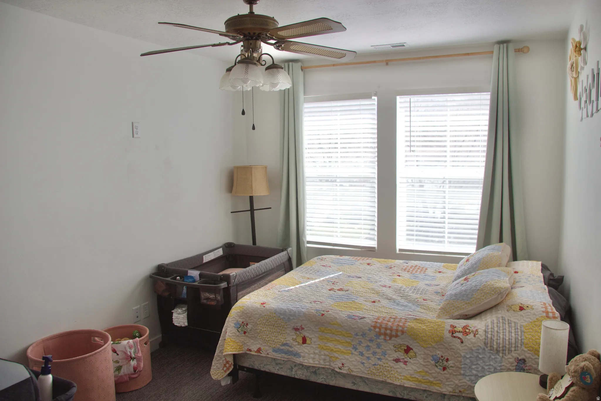 Bedroom with a ceiling fan