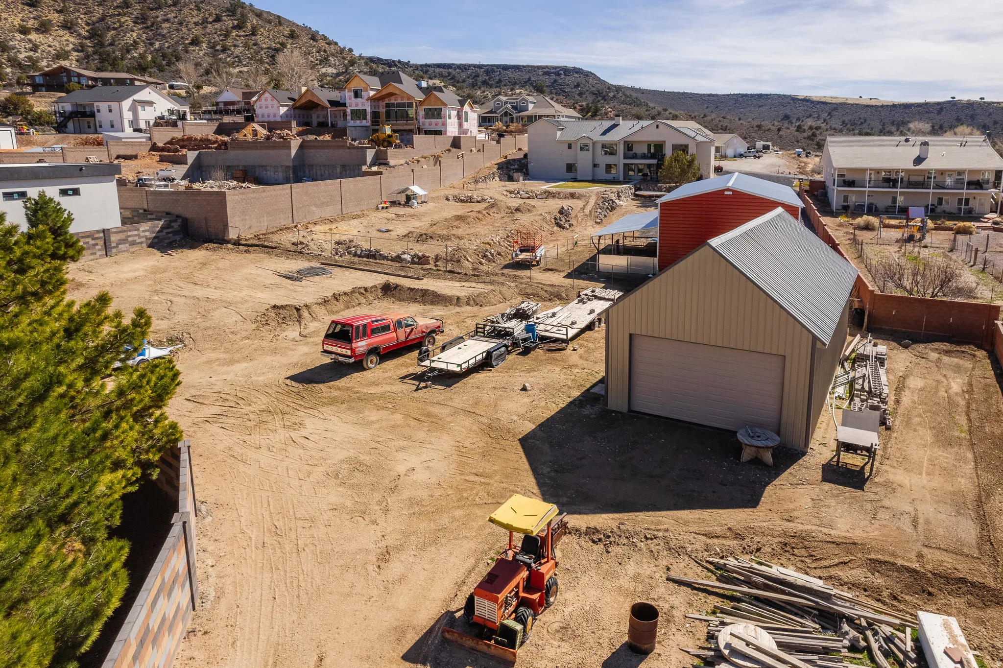 Aerial view of residential area with a mountainous background