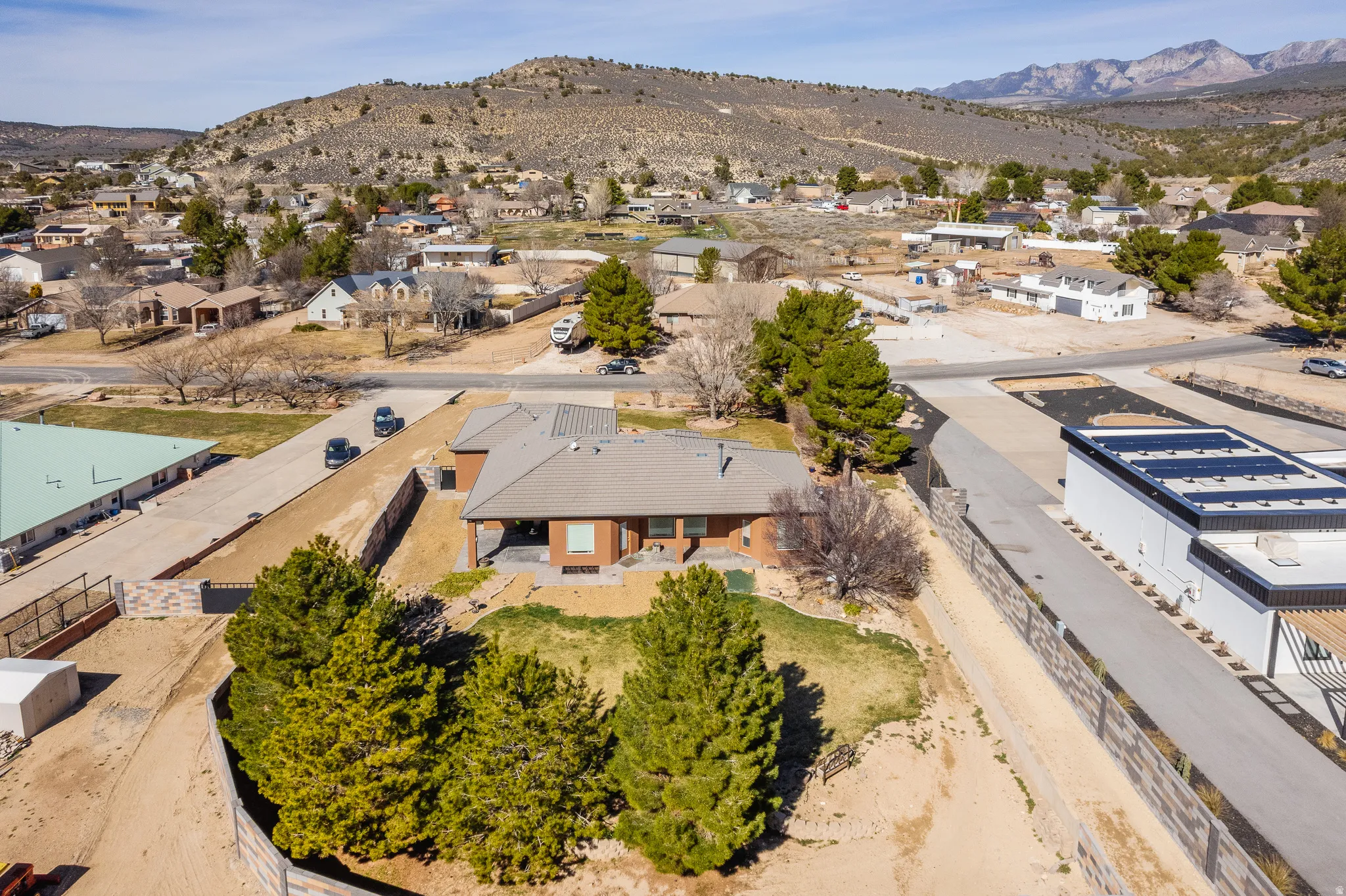 Aerial perspective of suburban area with mountains