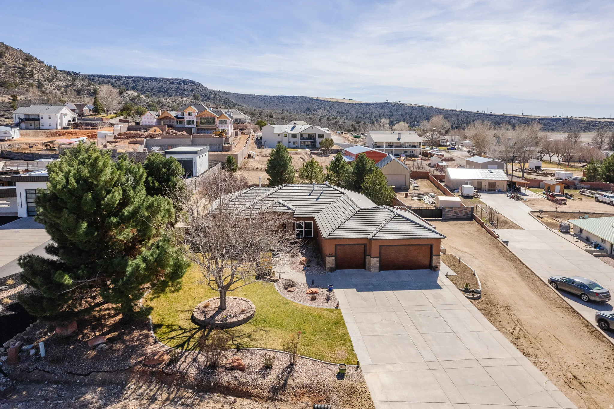 Aerial perspective of suburban area featuring mountains