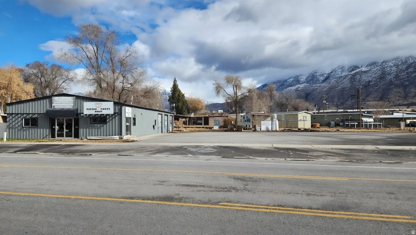 View of asphalt street with a mountain view