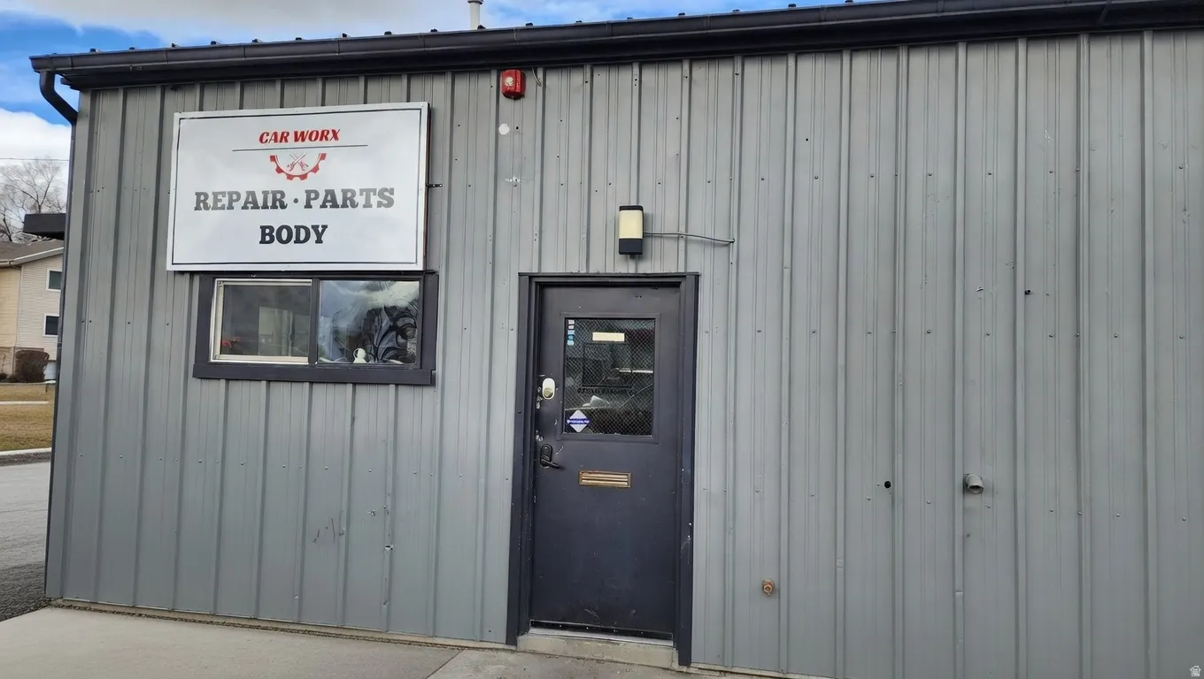 Entrance to property with board and batten siding