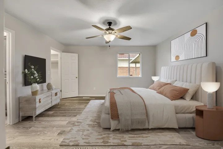 Bedroom featuring ceiling fan and light wood finished floors