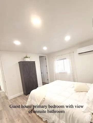 Bedroom featuring light wood-style flooring and recessed lighting
