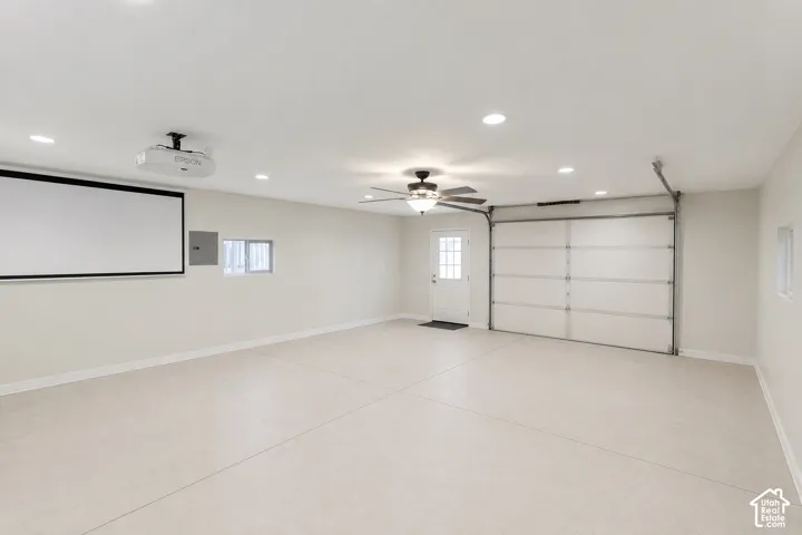 Detached garage used as office/shop/gym/theater room.