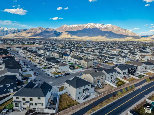 Aerial view of residential area with a mountain backdrop