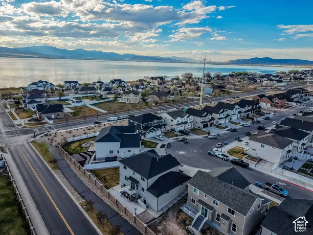 Aerial view of residential area with a water and mountain view