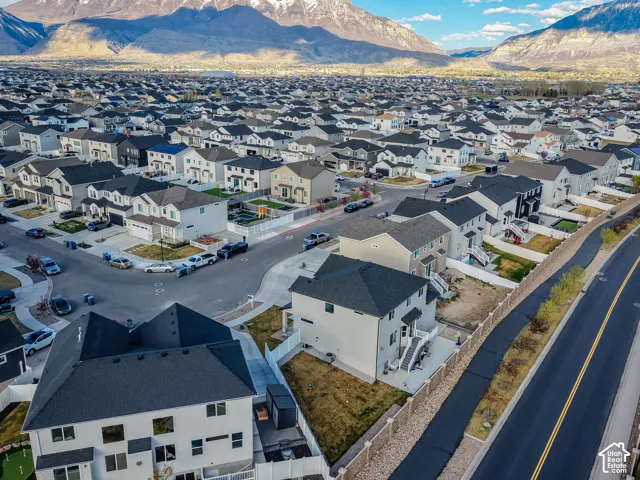 Aerial view of residential area with a mountainous background