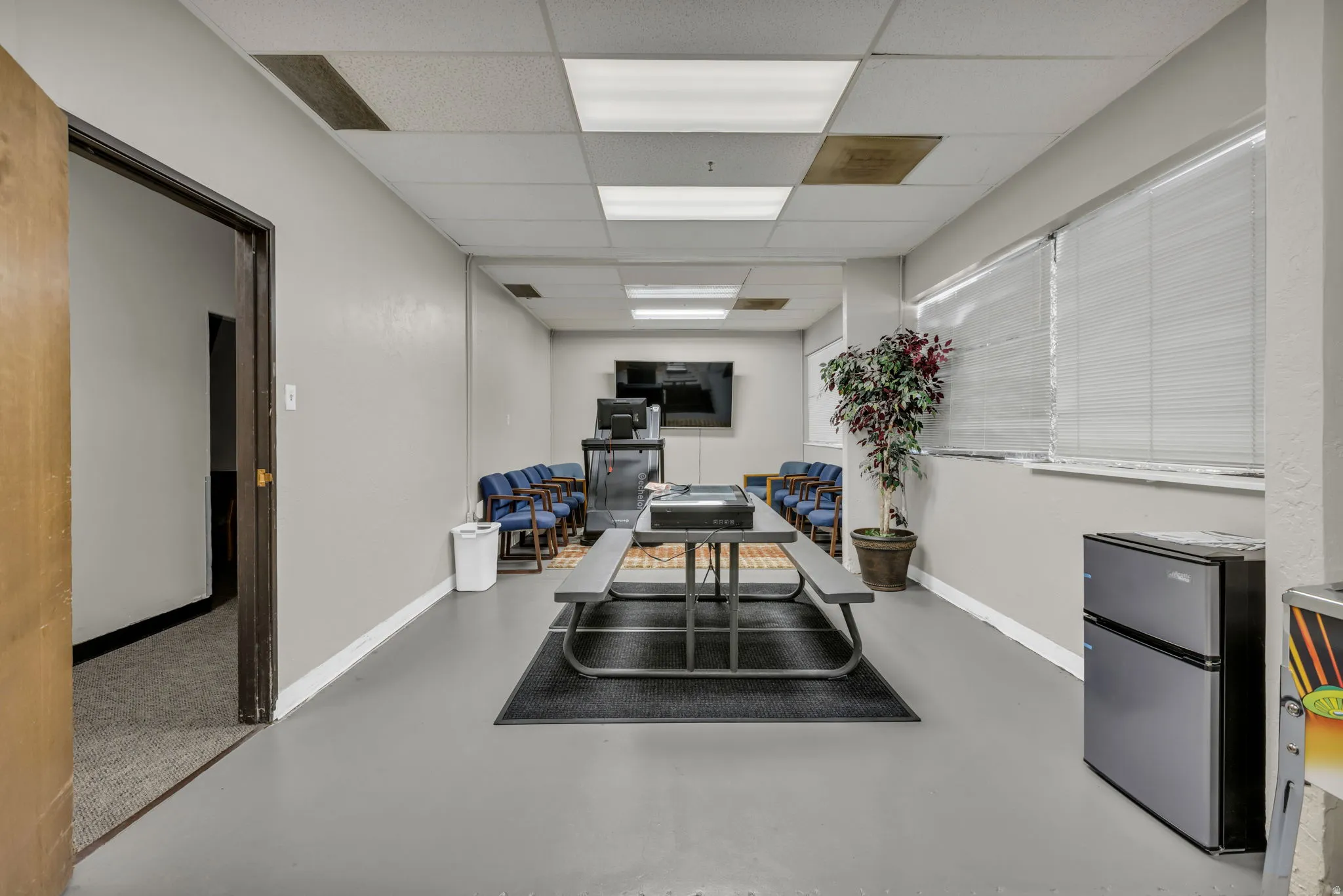 Office area featuring a drop ceiling